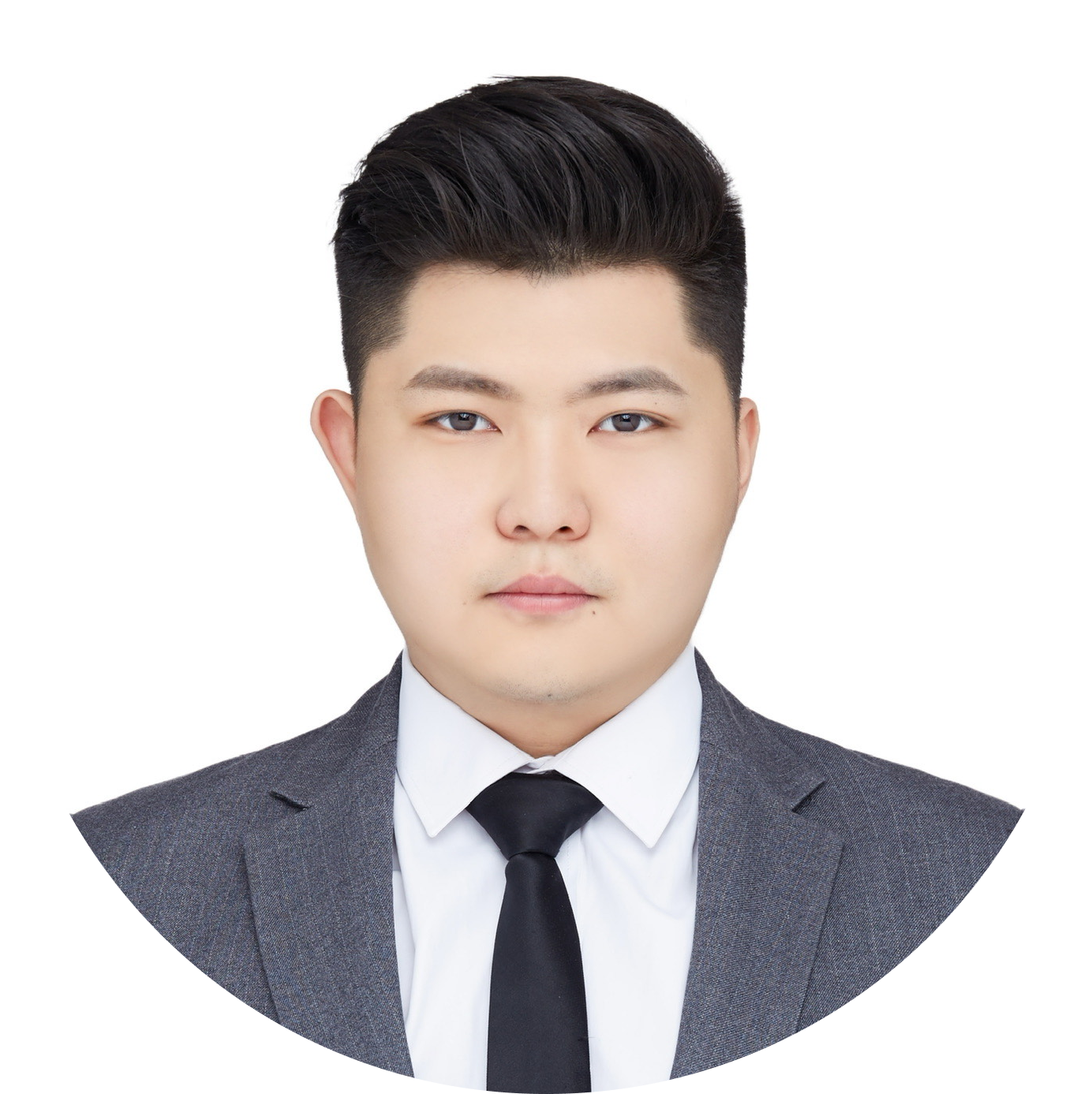 Professional headshot of a man in a gray blazer, white dress shirt, and black tie against a white background.
